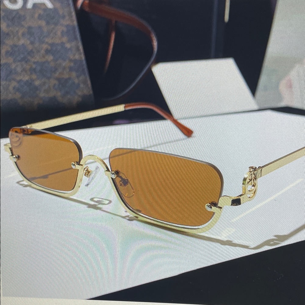 Elegant Gold Sunglasses with Brown Lenses